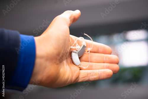 Hearing aid ear of man