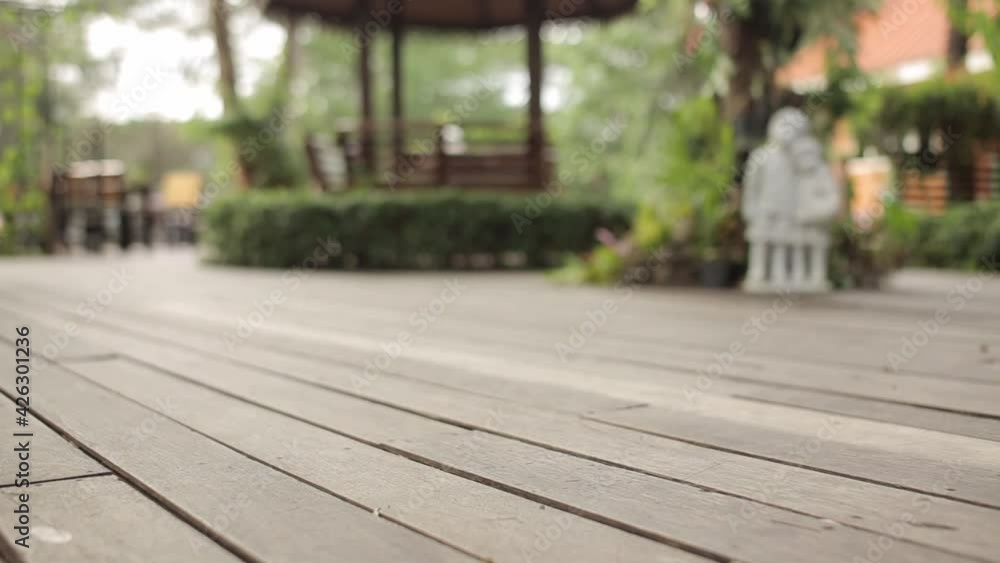 The background image of the courtyard, the wooden floor, a refreshing morning The background image of the courtyard, the wooden floor, a refreshing morning
