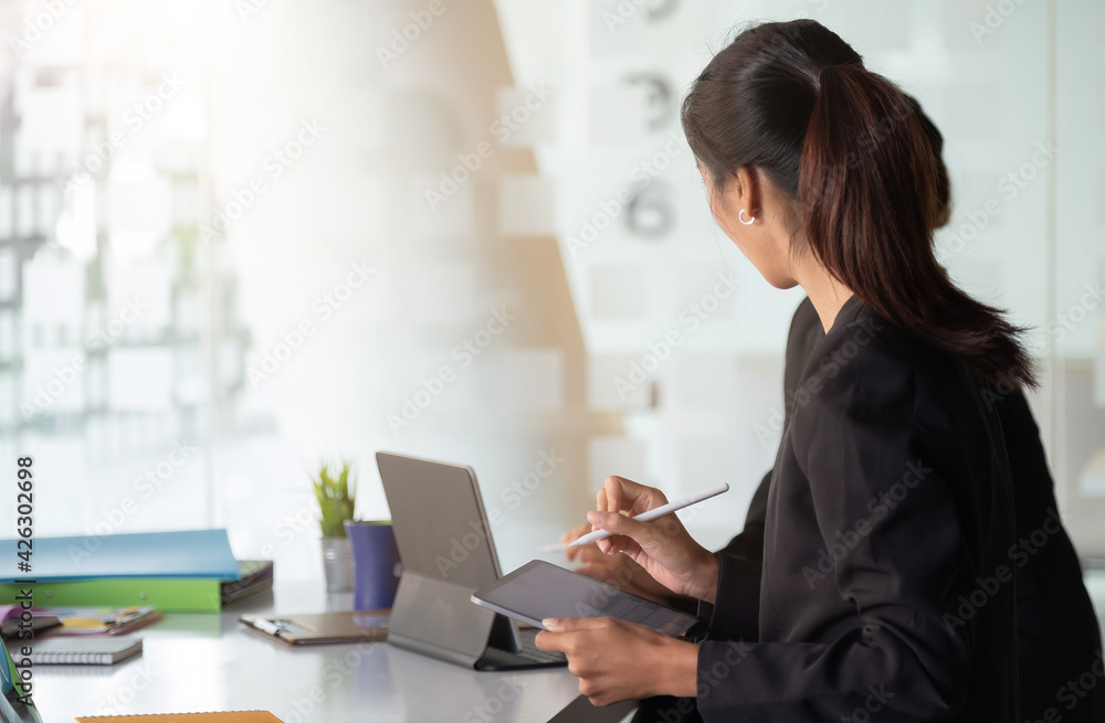 Group of Businessman and Accountant checking data document on digital tablet for investigation of corruption account . Anti Bribery concept Group of Businessman and Accountant checking data document on digital tablet for investigation of corruption account . Anti Bribery concept