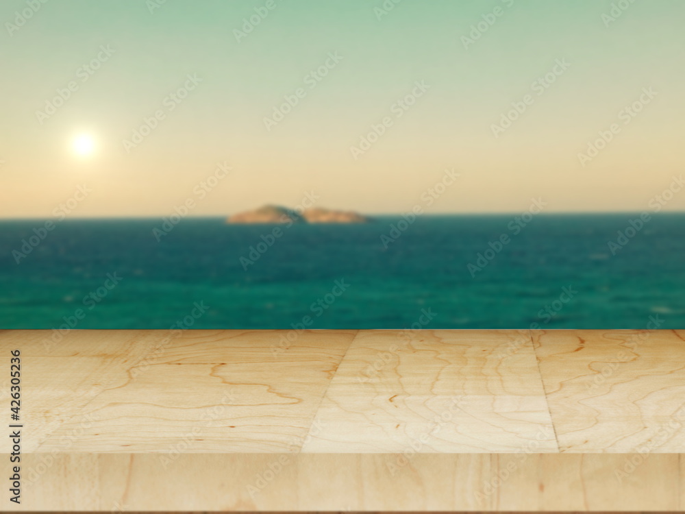 nice wood table with huge rock in sea background