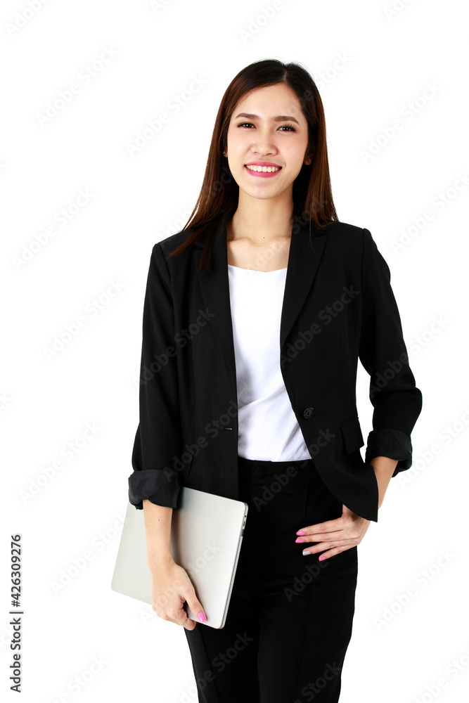 Vertical photo or Asian young long businesswoman lawyer wears black formal suit white inner shirt stand confidently look at camera hold silver laptop in arm on white background Vertical photo or Asian young long businesswoman lawyer wears black formal suit white inner shirt stand confidently look at camera hold silver laptop in arm on white background