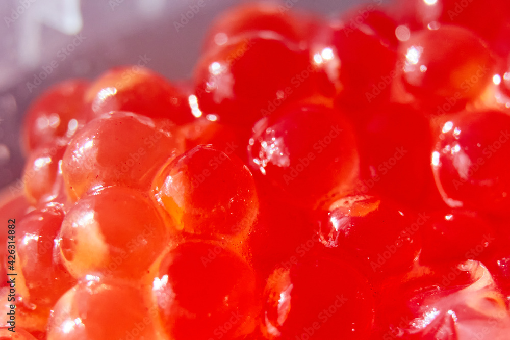 close-up background of red caviar in a jar close-up background of red caviar in a jar