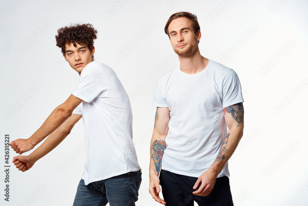 Cheerful friends in white t-shirts emotions movement Cheerful friends in white t-shirts emotions movement