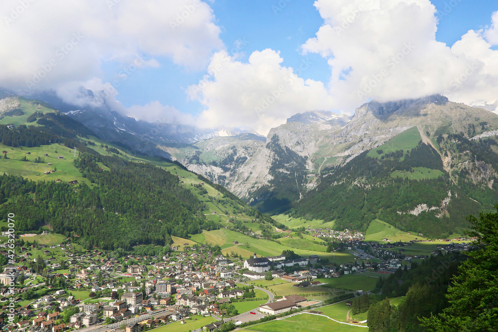 Swiss town Engelberg at the foot of the mountains, Switzerland. on the edge of town is the Benedictine monastery