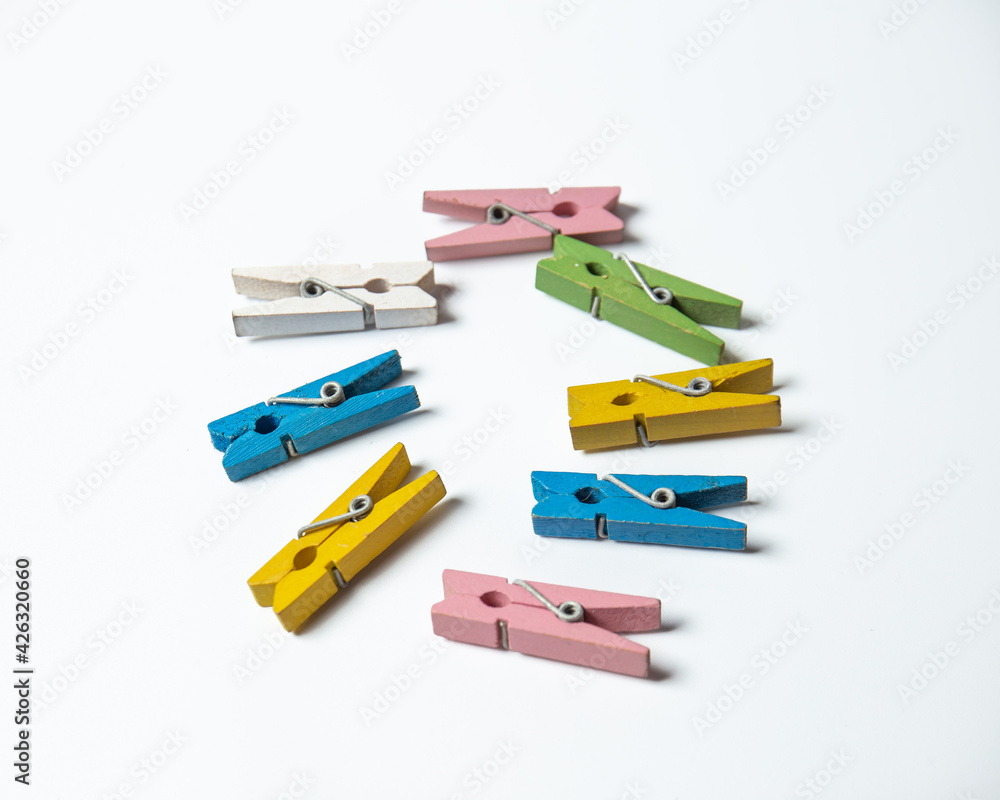 Several small clothespins with white background Several small clothespins with white background
