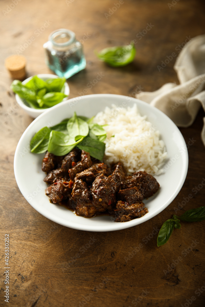 Homemade beef ragout with spinach and rice Homemade beef ragout with spinach and rice