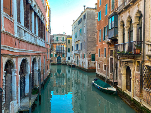 Small canal street in Venice  Italy