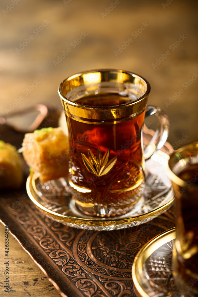 Traditional Turkish tea served with sweets Traditional Turkish tea served with sweets