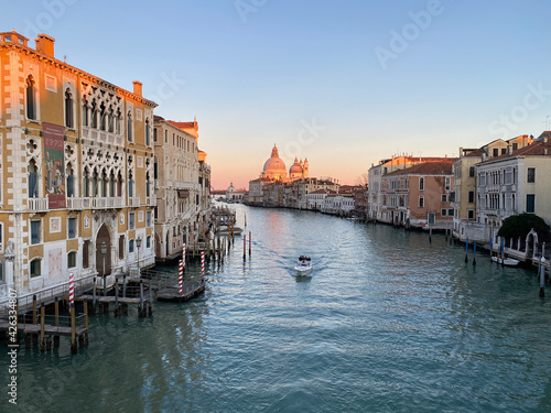 Venice, Italy, February 14, 2021 - View of the Grand Canal and Basilica Santa Maria della Salute from the Ponte dell'Accademia in Venice, Italy