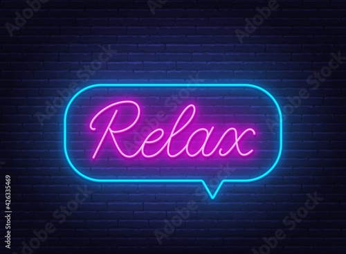 Relax neon sign in the speech bubble on brick wall background.