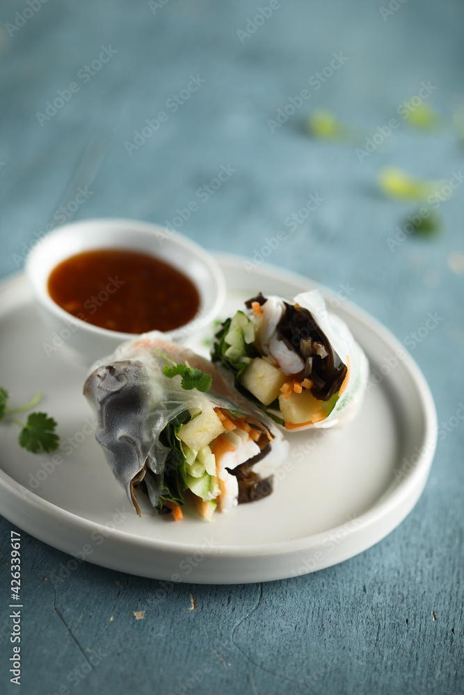 Traditional homemade fresh rolls with mango and crab Traditional homemade fresh rolls with mango and crab