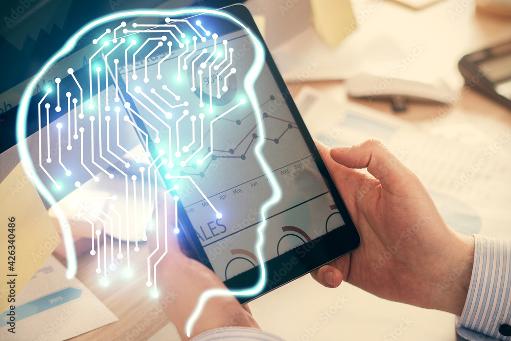 Double exposure of man's hand holding and using a digital device and brain hologram drawing. Data concept. Double exposure of man's hand holding and using a digital device and brain hologram drawing. Data concept.