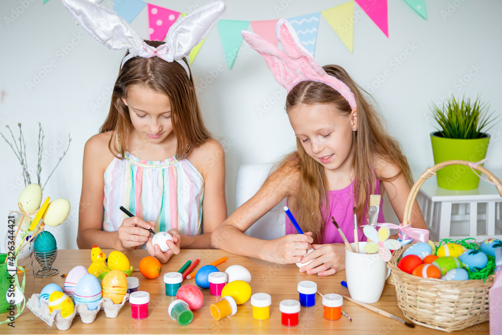 Happy easter. Beautiful little kids wearing bunny ears on Easter day. Happy easter. Beautiful little kids wearing bunny ears on Easter day.