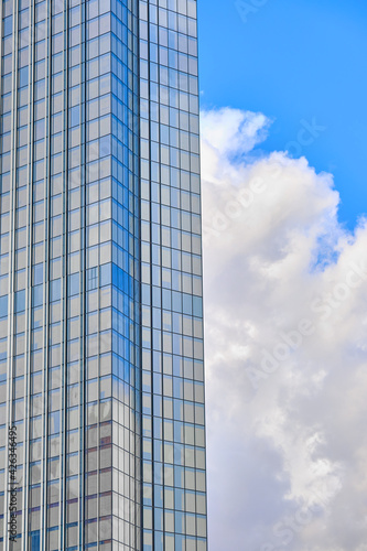 Architecture fragment of a skyscraper on the background of the sky. Business background