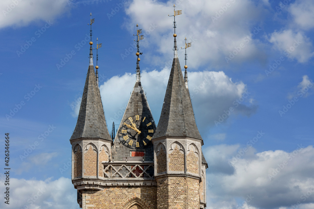town hall in the Netherlands with a belfry, a Flemish clock tower in Sluis in the Netherlands