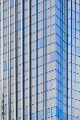 Architecture fragment of a skyscraper on the background of the sky. Business background