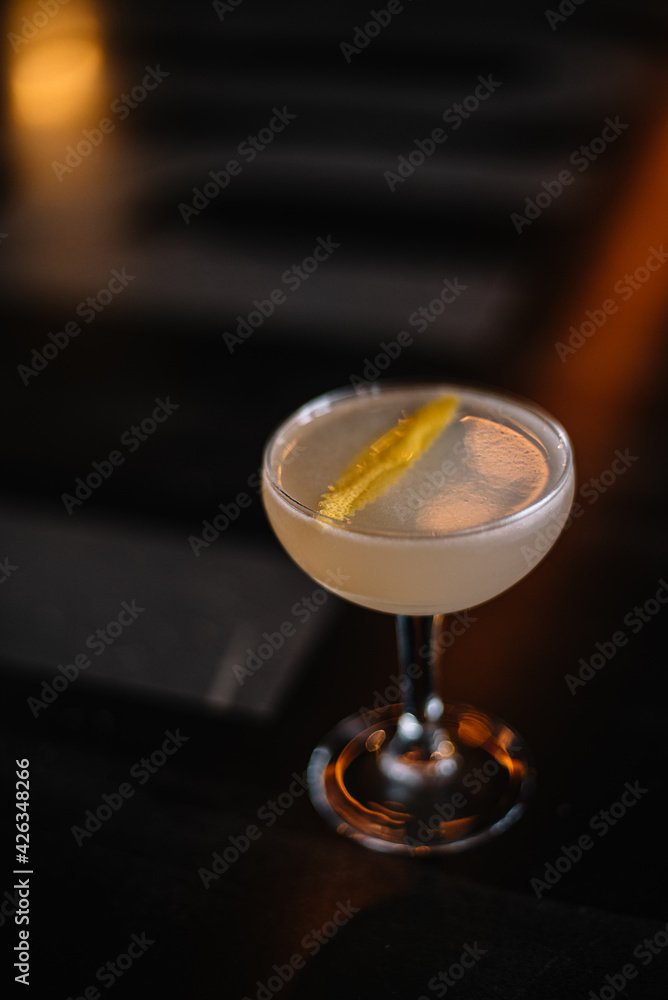 Hemingway Daiquiri cocktail decorated with lemon zest. Hemingway Daiquiri cocktail decorated with lemon zest.