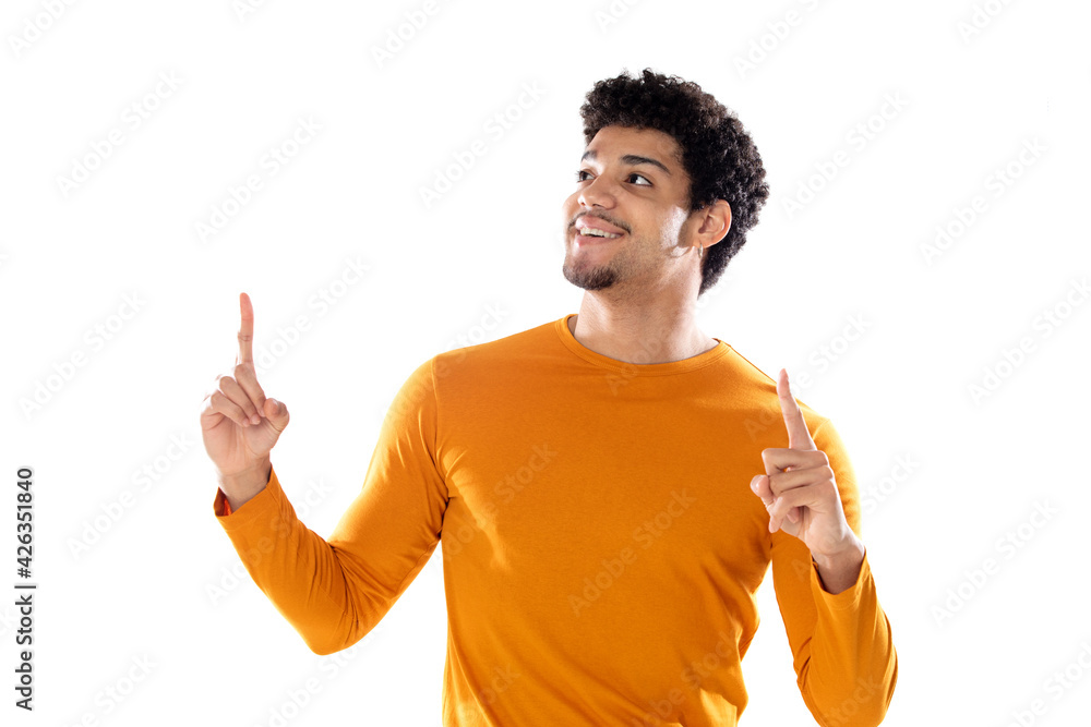 Young black afro guy laughing and pointing to something with his finger Young black afro guy laughing and pointing to something with his finger