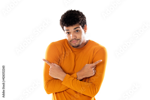 Handsome afro guy pointing to different directions photo