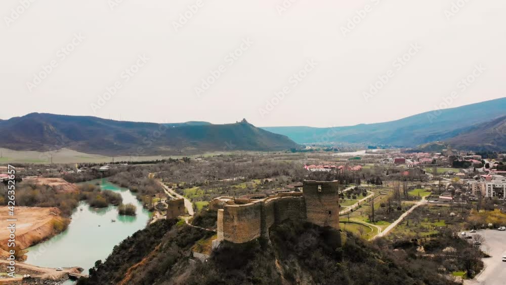 Aerial zoom out view Bebris - Tsikhe fortress historical landmark in Mtskheta