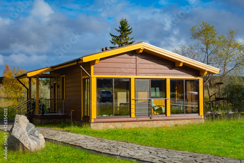 Cottage with a large verand...