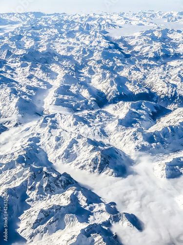 aerial view of the alps covered of snow during winter © Eric Isselée