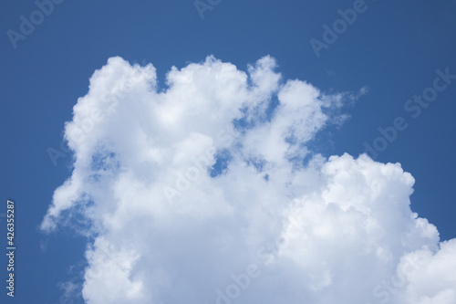 White clouds are in blue sky at daytime  natural panoramic background photo.