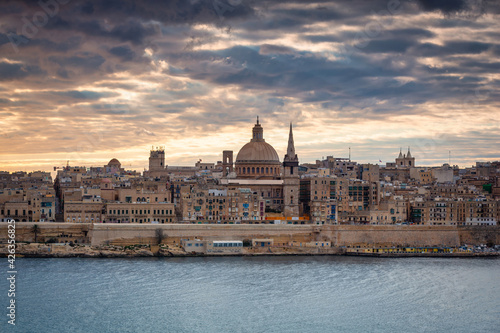 Beutiful coastline of Valletta city at sunrise, the capital of Malta. © Patryk Kosmider