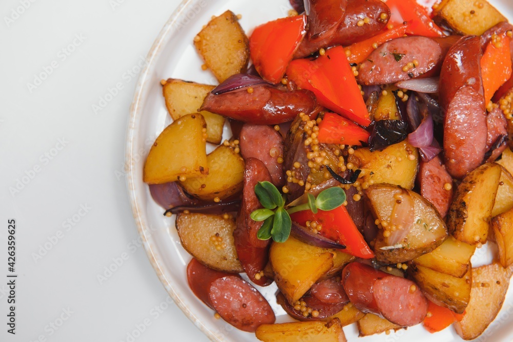 potatoes with meat and vegetables white background potatoes with meat and vegetables white background