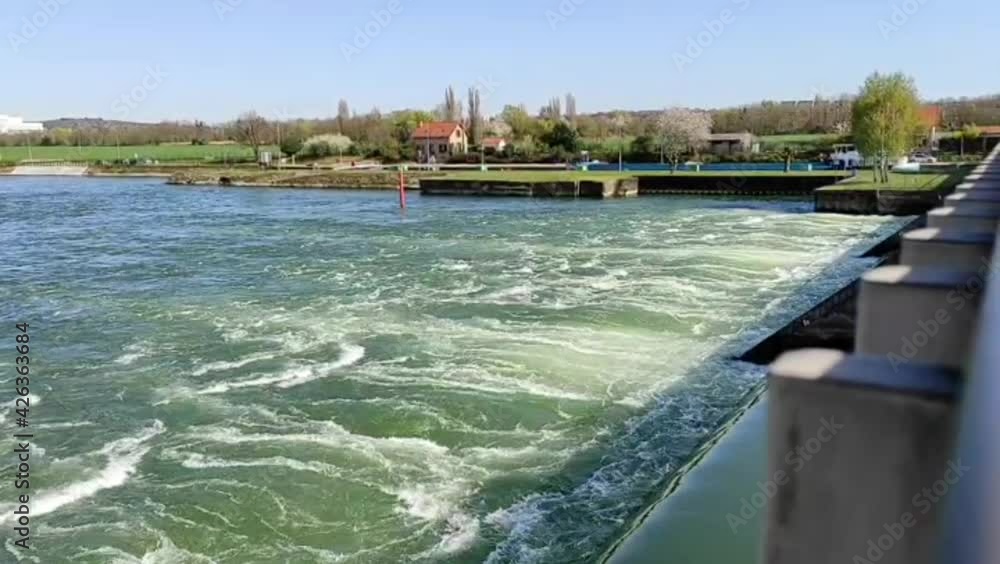 Panorama from the bridge on the river Seine in the spring. Carriage of goods on the river Panorama from the bridge on the river Seine in the spring. Carriage of goods on the river
