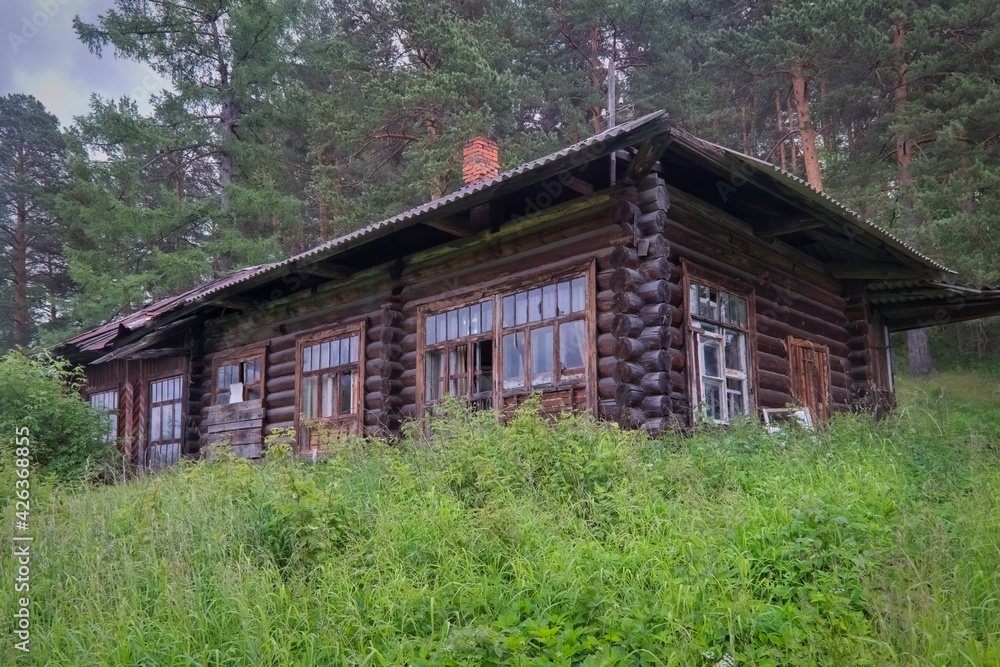 Abandoned old wooden log house in the forest. Abandoned old wooden log house in the forest.