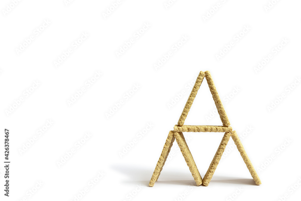 pyramid triangular from cereal loaves of healthy food on white background. Dietary. Healthy food pyramid triangular from cereal loaves of healthy food on white background. Dietary. Healthy food