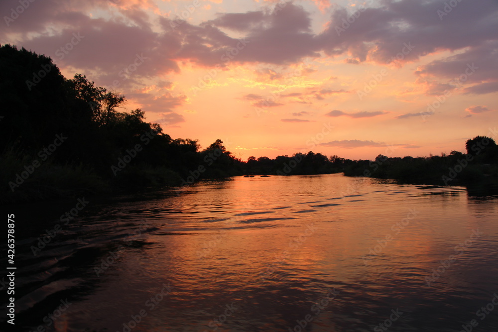 beautiful sunset at the okavango river in namibia beautiful sunset at the okavango river in namibia