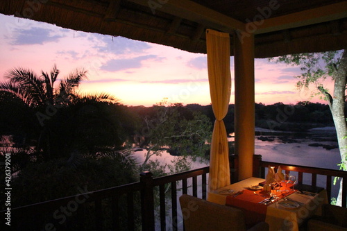 beautiful sunset at the okavango river in namibia