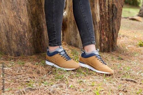 Fashion - shoes with ankle boots photo on a natural background. © gonzalocalle