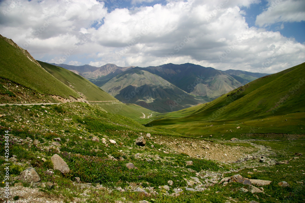 Winding Road in the Tian Shan Mountains leading to Song Kol Lake, Kyrgyzstan, Central Asia