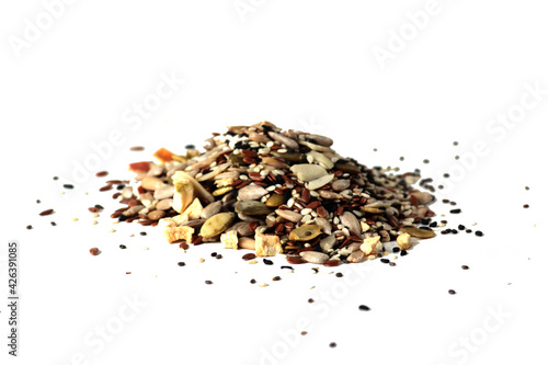 a pile of seeds for salad seasoning isolated against white background