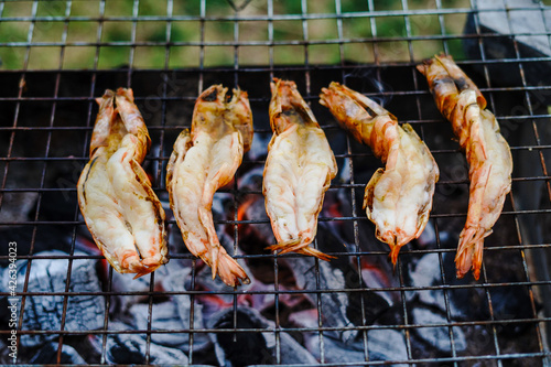Five prawns on the grill