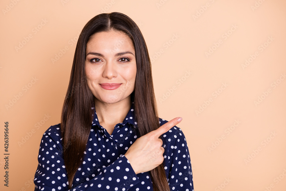 Portrait of pretty satisfied lady direct finger empty space proposition wear retro isolated on beige color background Portrait of pretty satisfied lady direct finger empty space proposition wear retro isolated on beige color background