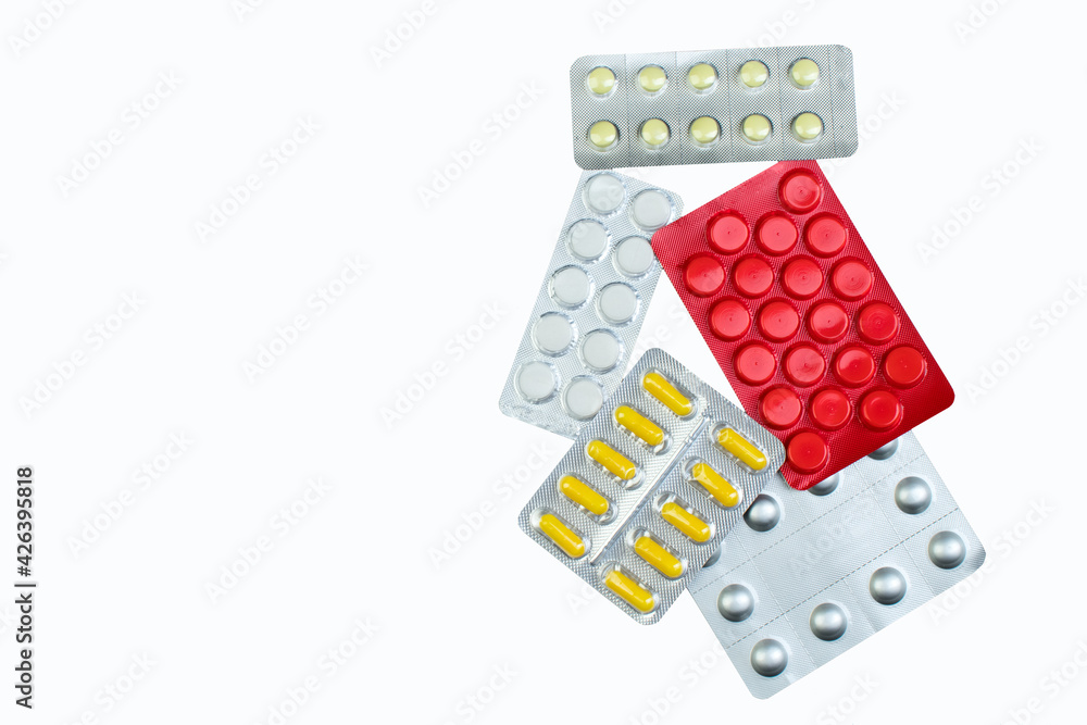 pharmaceuticals pills, tablet and capsules medicine on white background. Copy space for text. pharmaceuticals pills, tablet and capsules medicine on white background. Copy space for text.