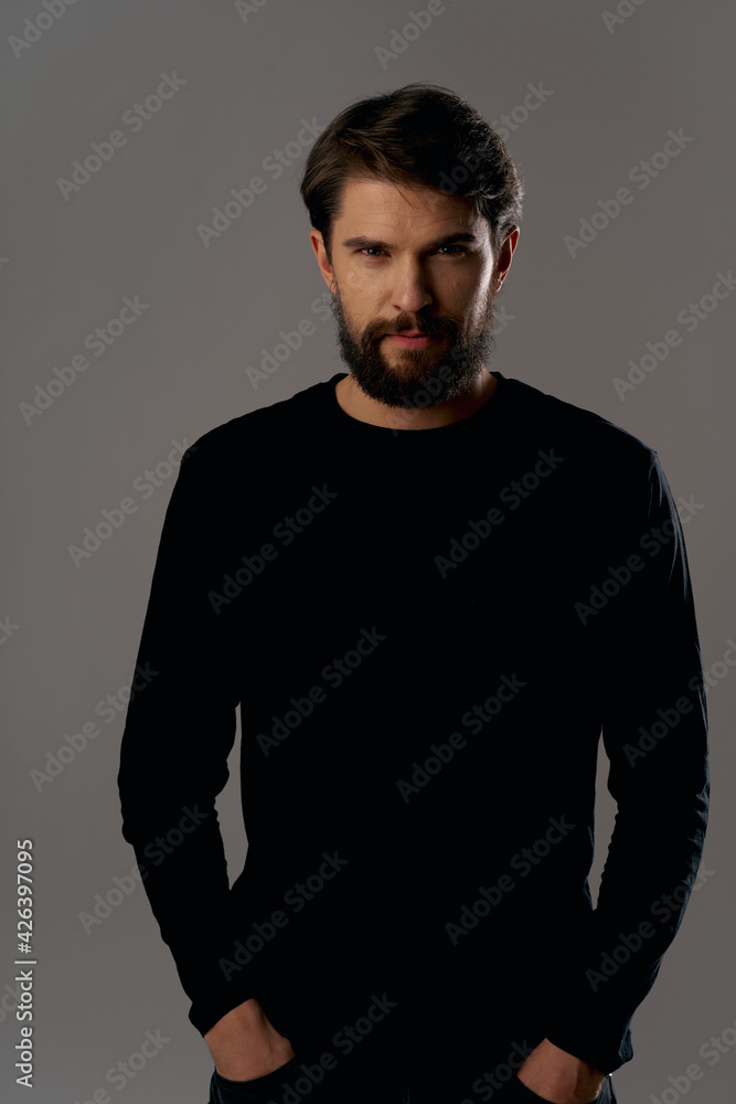 Obraz premium bearded man in black sweater elegant style fashion serious look