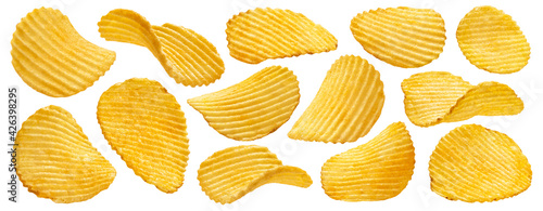 Ridged potato chips isolated on white background photo
