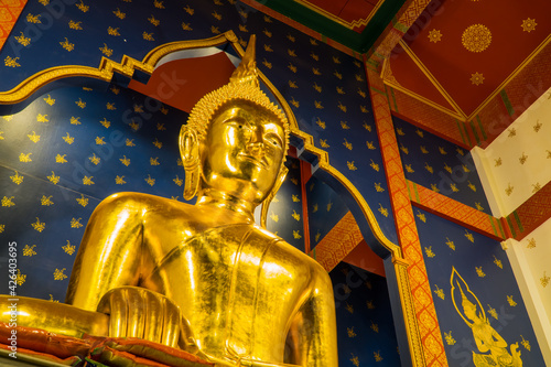 BANGKOK, THAILAND - April 3, 2021: Golden buddha statue in Wat Saket Golden Mountain Temple famous, is a Buddhist temple in Pom Prap Sattru Phai district, Bangkok. A popular Landmark photo