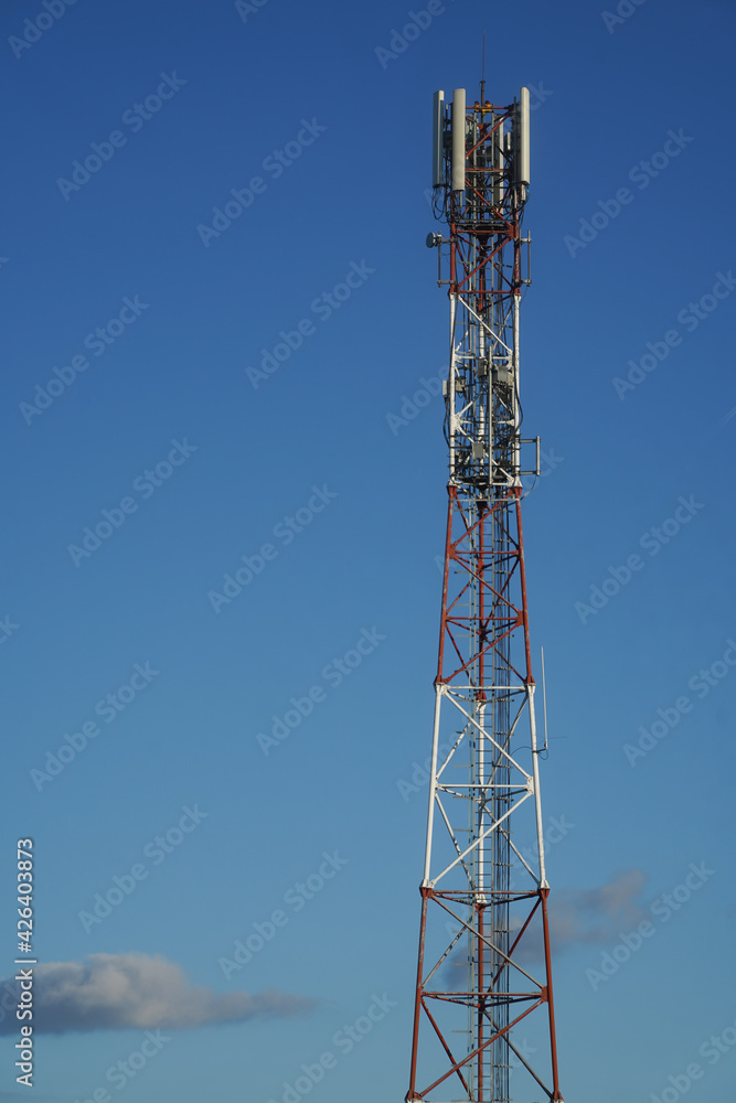 antena. scaffolding with antennas on a blue background.