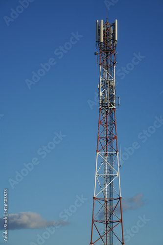 antena. scaffolding with antennas on a blue background.
