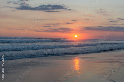 Beautiful sunset sky on the beach in Matapalo, Costa Rica. Central America. Sky background on sunset. Tropical sea.