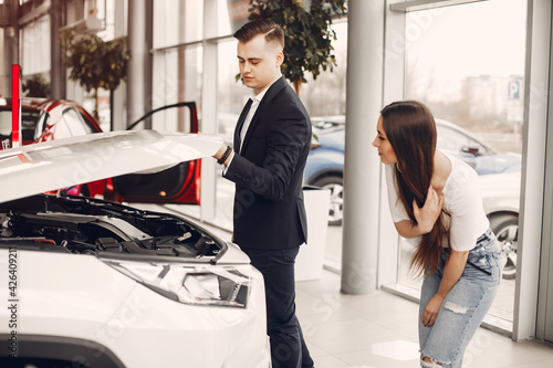 Stylish and elegant woman in a car salon © prostooleh