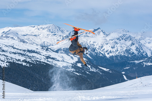 Young man skiing in the Pyrenees at the Grandvalira ski resort in Andorra in Covid19 time.