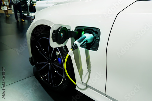 Charging an electric car,EV Car or Electric car at charging station, Future of transportation. 