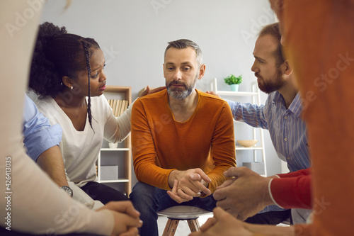 Εκτύπωση καμβά Multiracial people communicate and support each other in group therapy session